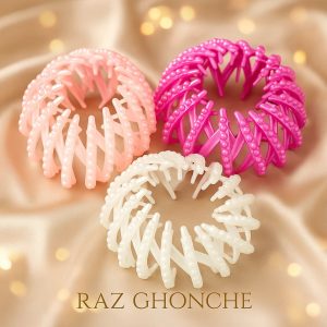 colorful pearl design plastic hair coils in pink peach and ivory tones on satin background