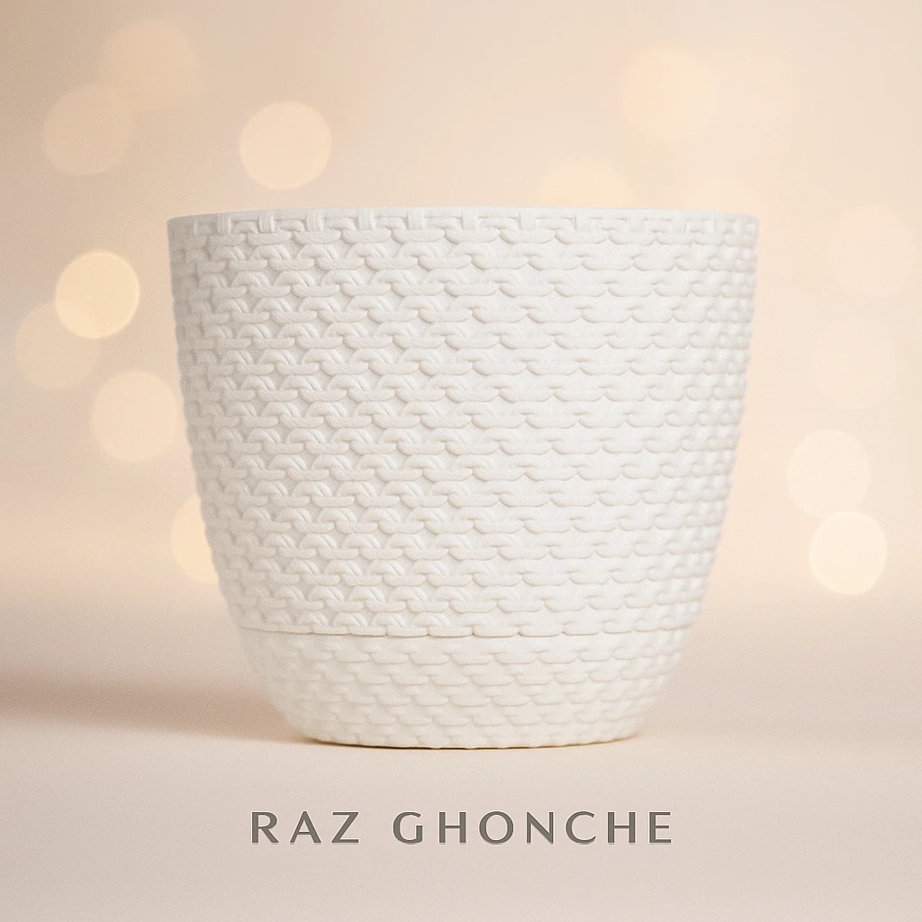 White plastic plant pot with a woven texture pattern, displayed against a soft beige background with warm bokeh lights.
