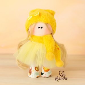 yellow russian‑style cloth doll with long blonde hair, fur hat and scarf, yellow tulle skirt and colorful boots, RAZ GHONCHE