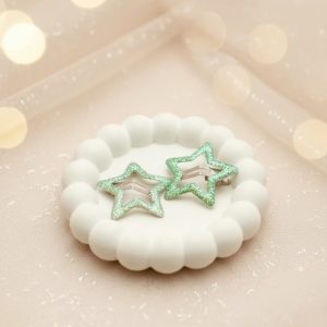 glitter star hair clips set of two