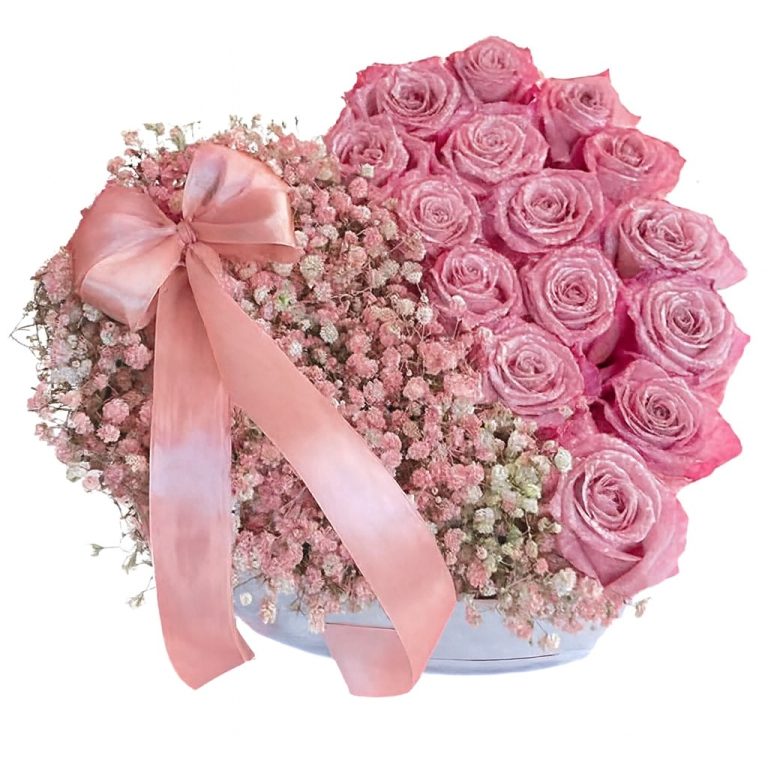 Luxury pink heart-shaped flower box with pink roses, pink gypsophila and satin ribbon.