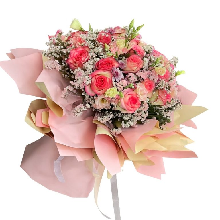 Luxury pink bouquet with pink roses, lisianthus, gypsophila and layered pink-cream wrapping.