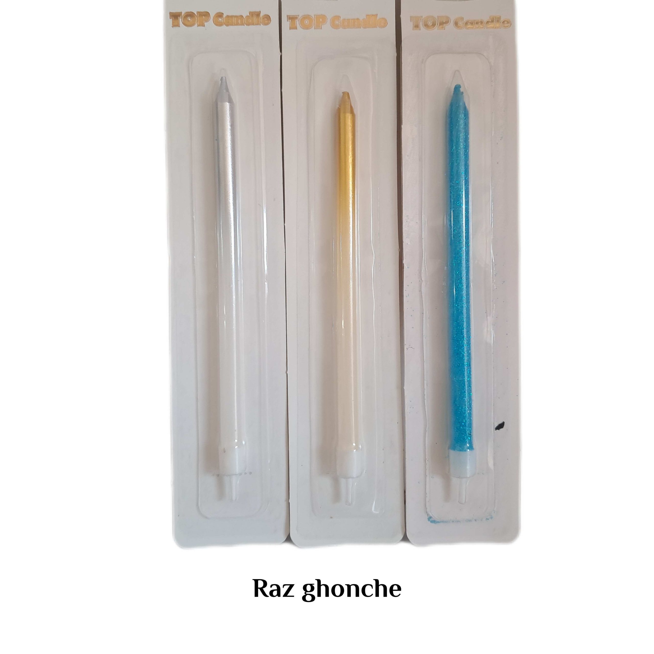 Three individually packaged stick birthday candles: one silver metallic, one gold metallic, and one bright blue glitter. All packages are branded “TOP Candle”.