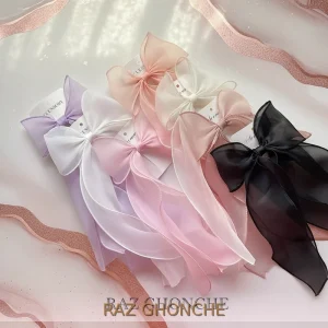 elegant chiffon hair bows in pastel shades of white pink peach lilac and black