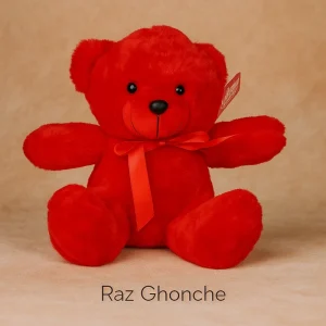 red teddy bear plush toy with ribbon bow sitting on beige background