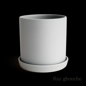 Minimalist matte gray cylindrical ceramic pot with a matching saucer, presented against a solid black background.