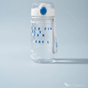 Clear, cylindrical water bottle with a white lid and a bright blue push-button lock. The body is decorated with blue and white motivational English phrases like “BE GOOD FIN” and “TEN CRFUL”. It includes a white carrying strap with the word “HEY!” in blue.